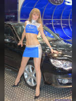 photo from the publication "Sasha at the exhibition 4WD Salon", author Владимир, Tags: [exhibitions, pantyhose (tights) skin color, shoes black, heels, car, , blonde, blonde, the skirt is very short, events of 2007, Alexandra (Sasha) Kravchenko, long legs, events, pantyhose (tights) sheer, transparent, car show]