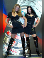 photo from the publication "ProdExpo'2009 - girls stand vodka "Kazenka"", author Эдуард@fotovzglyad, Tags: [exhibitions, pantyhose (tights) skin color, short dress, heels, cleavage, black boots, Prodexpo, boots above the knee (jackboot), Catherine (Kate) Ganicheva, black dress, events of 2009, high slit, pantyhose (tights) with glitter, events, Girl Kazёnka]