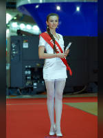 photo from the publication "METAL 2012. Lasers 2.", author Эдуард@fotovzglyad, Tags: [exhibitions, dress white, shoes white, events of 2012, stockings white, stocking tops visible, Metal-Working, plaits / braids, dress very short (mini-dress), high heels, dress fitting, tight, slinky, events, stiletto heels, high arched feet]