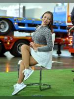 photo from the publication "Komtrans-2019. Elka. ", author Эдуард@fotovzglyad, Tags: [exhibitions, pantyhose (tights) skin color, Comtrans, skirt white, sneakers, short skirt (miniskirt), sitting legs crossed, events, pantyhose (tights) sheer, transparent, events of 2017, car show]
