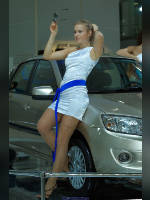 photo from the publication "Interauto 11. WHA.", author Эдуард@fotovzglyad, Tags: [exhibitions, pantyhose (tights) skin color, Anna (Anya) Kasyanova, short dress, dress white, Moscow, car, Interauto and MIMS, Russia, events of 2011, lifting leg, dress fitting, tight, slinky, events, girls AvtoVAZ, car show]
