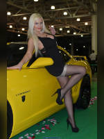 photo from the publication "Moscow Tuning Show 2012. Victoria", author Иван, Tags: [exhibitions, Moscow Tuning Show, pantyhose (tights) black, cleavage, events of 2012, car, blonde, Victoria (Vic) Yevtushenko, lifting leg, events, tights with imitation stockings, car show]
